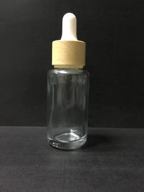 帽子のSkincareのプラスチック包装を用いる透明な30ml精油の瓶ガラスの点滴器のびん