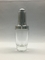 血清の精油のための贅沢で明確なガラス点滴器のびん30mlの銀製の点滴器