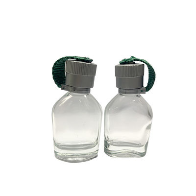ガラスOEM 25MLの小さい旅行やかんの設計帽子を香水瓶