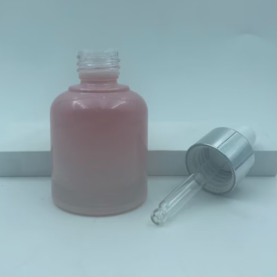 2025年 再利用可能なピンクガラス瓶 オイル用ドロッパーボトル シルバーカラー 高級卸売 30ml