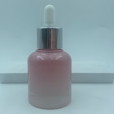2025年 再利用可能なピンクガラス瓶 オイル用ドロッパーボトル シルバーカラー 高級卸売 30ml