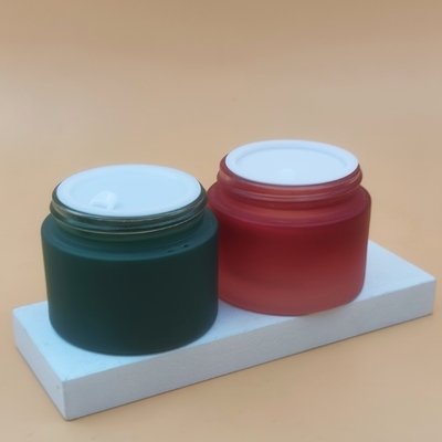 20g 30g 50gの青いガラス化粧品のクリームの瓶、ガラス瓶の化粧品の包装のクリーム色のびんOEM